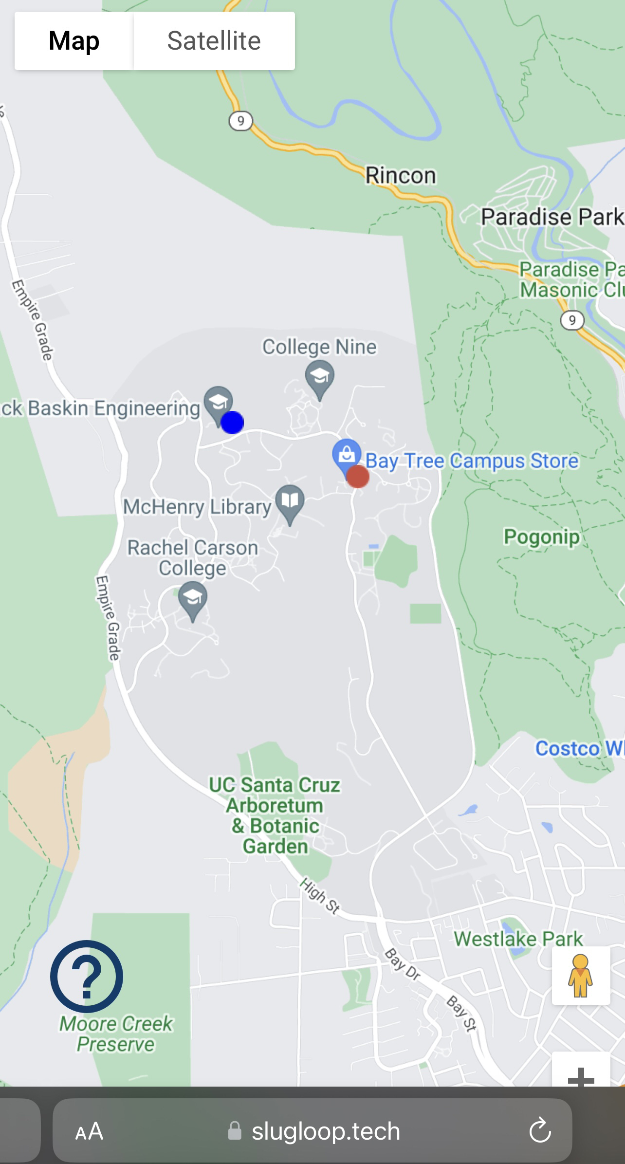 iPhone screenshot of slugloop.tech live in 2023, with two buses tracked on the UCSC campus map